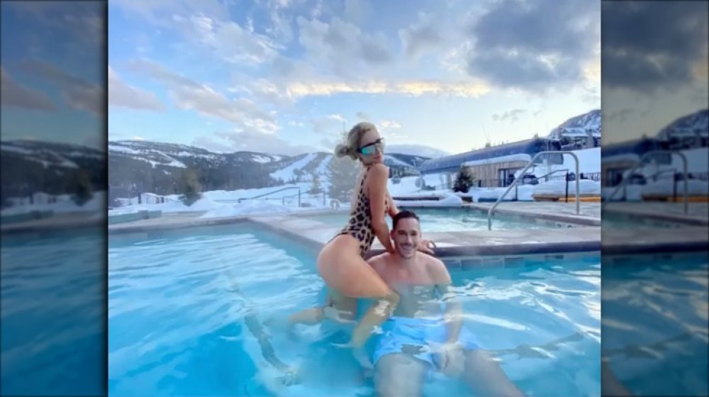 Paris Hilton and Carter Reum in a pool in Montana