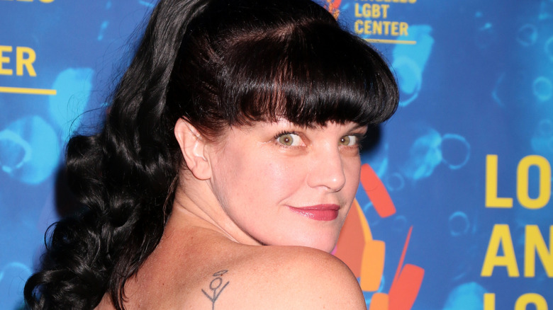 Pauley Perrette shows off a tattoo