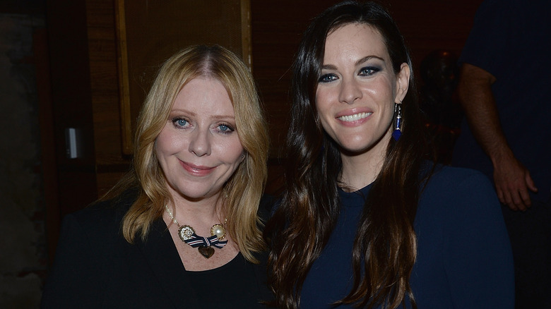 Bebe Buell poses with daughter Liv Tyler