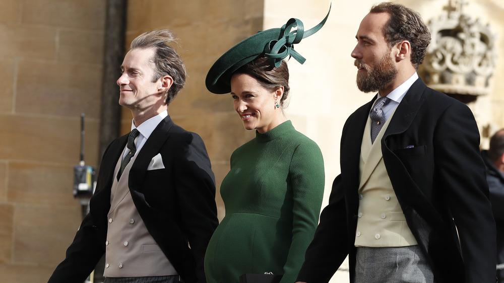 A pregnant Pippa Middleton with James MAtthews