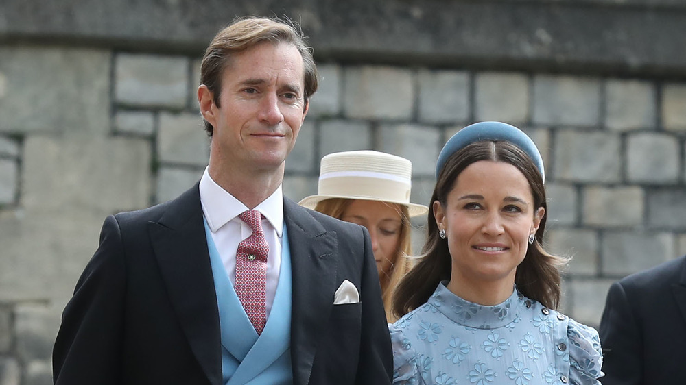 Pippa Middleton and James Matthews walking outside 