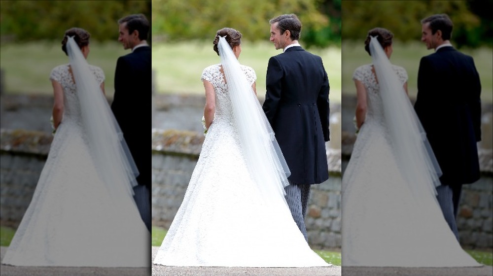 Pippa Middleton and James Matthews on their wedding day, from behind