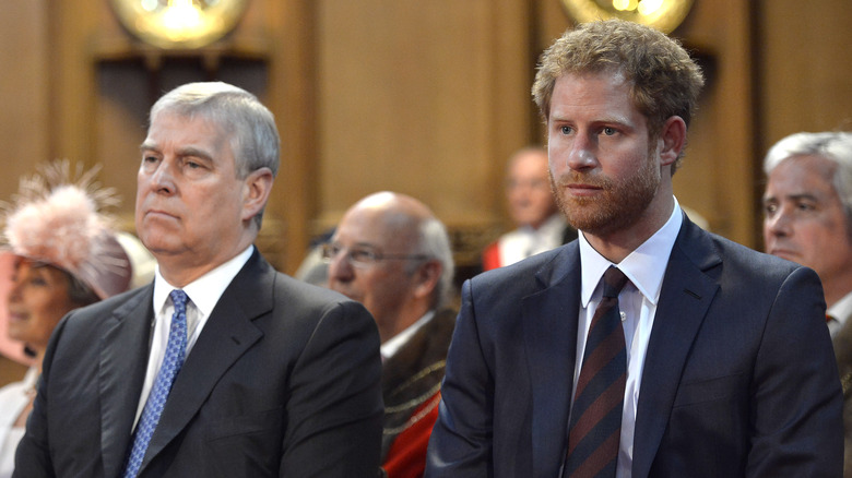 Prince Andrew and Prince Harry sitting