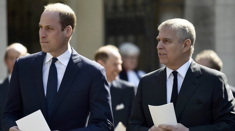 Prince William and Prince Andrew walking