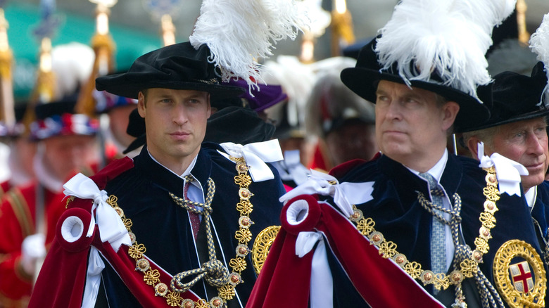 Prince William and Prince Andrew walking