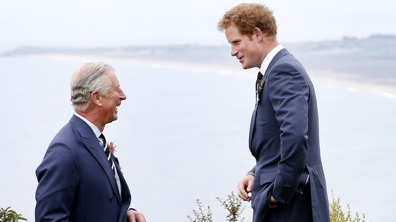 Prince Harry and King Charles laughing together