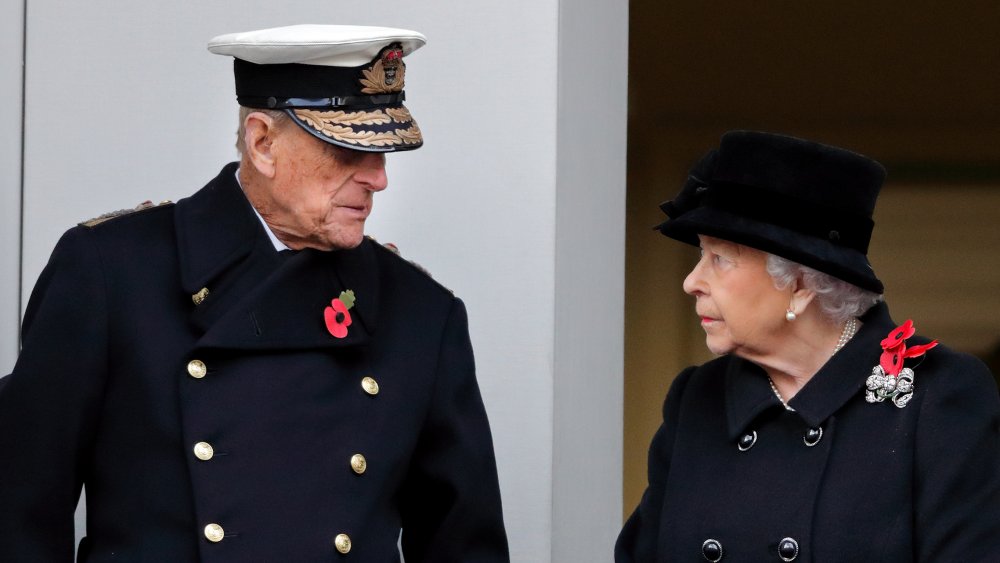 Prince Philip  and Queen Elizabeth in navy attire