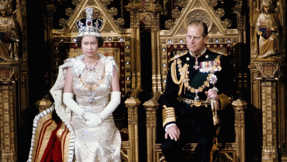 Queen Elizabeth and King Philip on their thrones in the 1970s