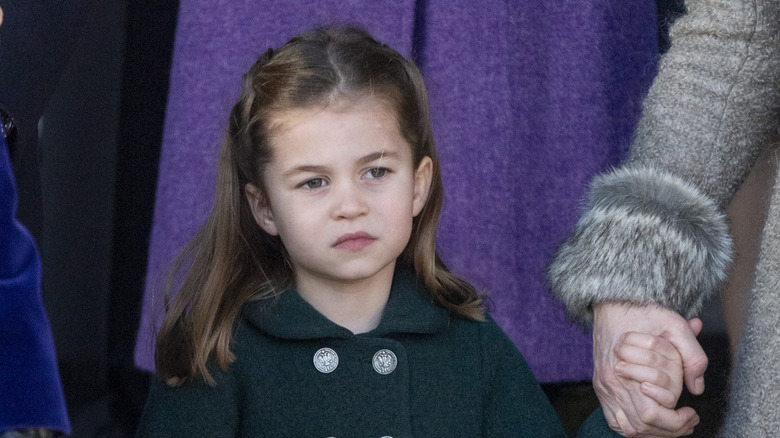 Princess Charlotte in a green coat