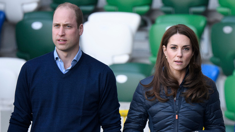 Prince William and Princess Catherine walking in stadium