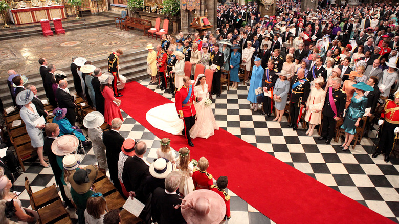 Prince William and Princess Catherine walking down Westminster Abbey aisle