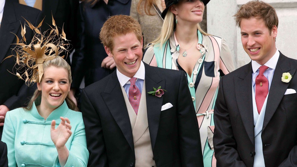 Prince William laughing with his brother and stepsister