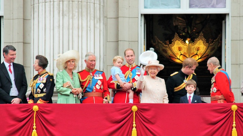 Timothy Laurence posing with Queen Elizabeth and other members of the royal family