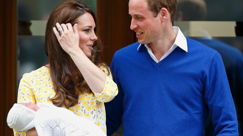 Princess Charlotte on the day she was born with Kate Middleton and Prince William