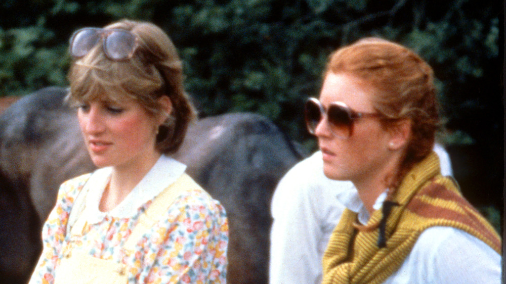 Princess Diana and Sarah Ferguson outside with horses