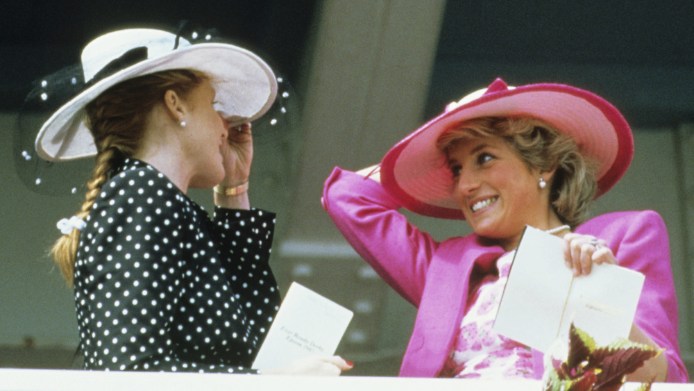 Sarah Ferguson and Princess Diana smiling at each other