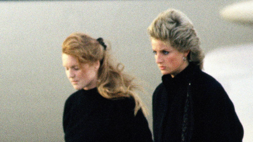 Sarah Ferguson and Princess Diana stepping off a plane