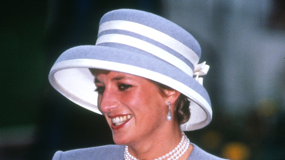 Princess Diana wearing a lavender outfit