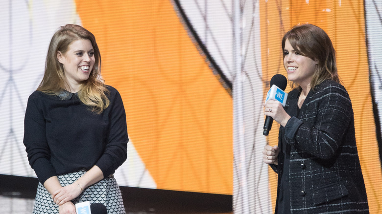 Princesses Eugenie, Beatrice speaking onstage