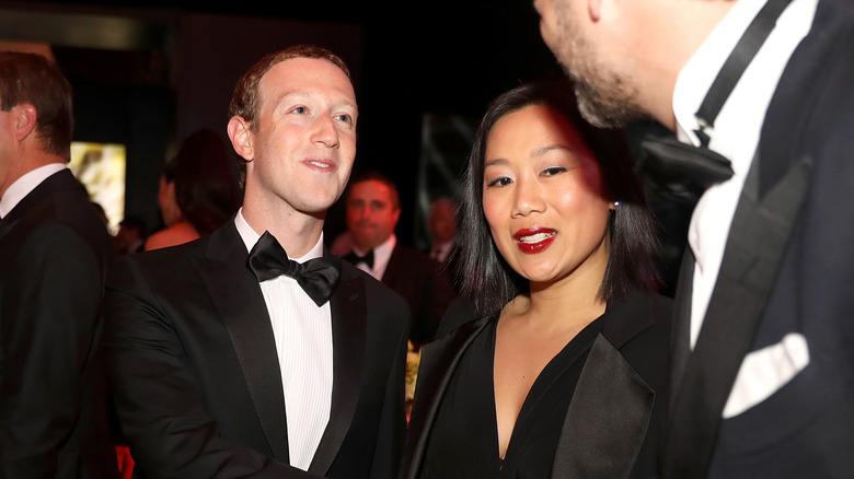 Priscilla Chan and Mark Zuckerberg attending an event