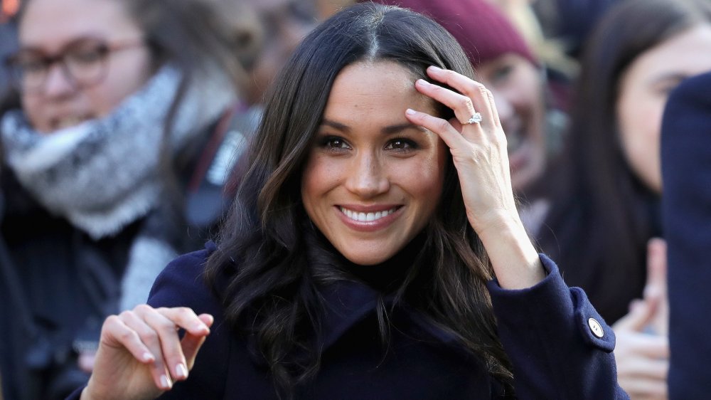 Meghan Markle, who has a complicated relationship with Queen Elizabeth