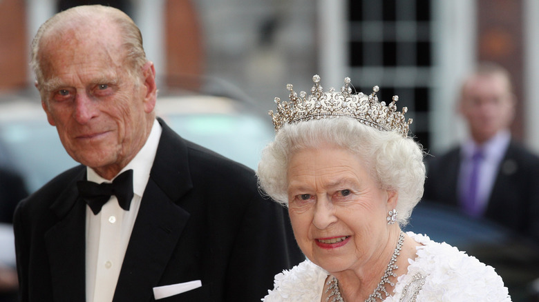 Queen Elizabeth wearing tiara and Prince Philip