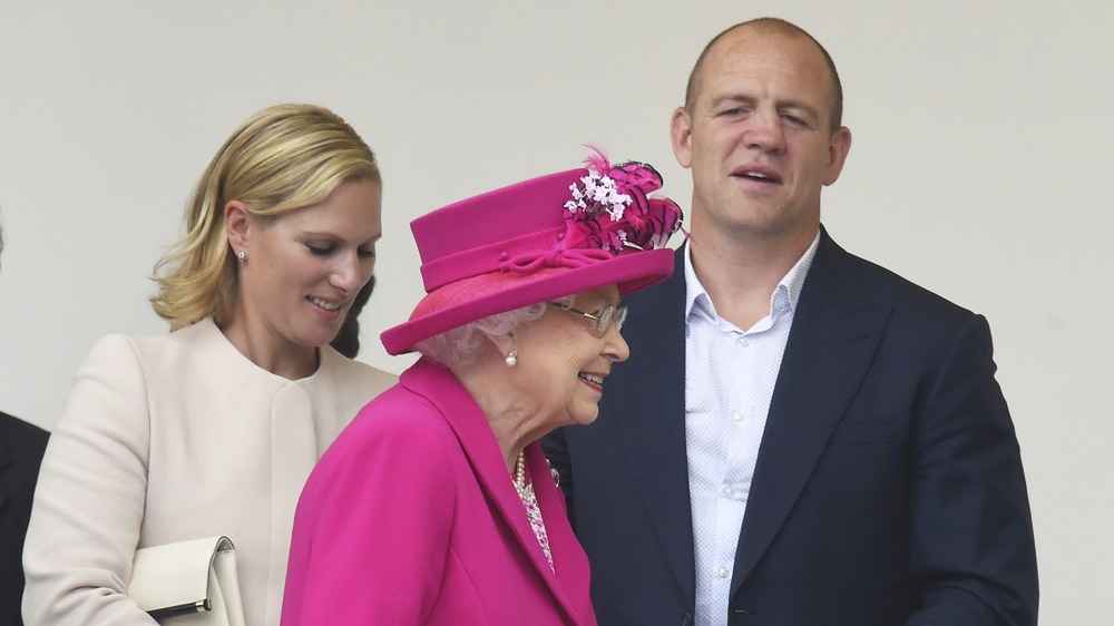 Mike Tindall laughing with Queen Elizabeth