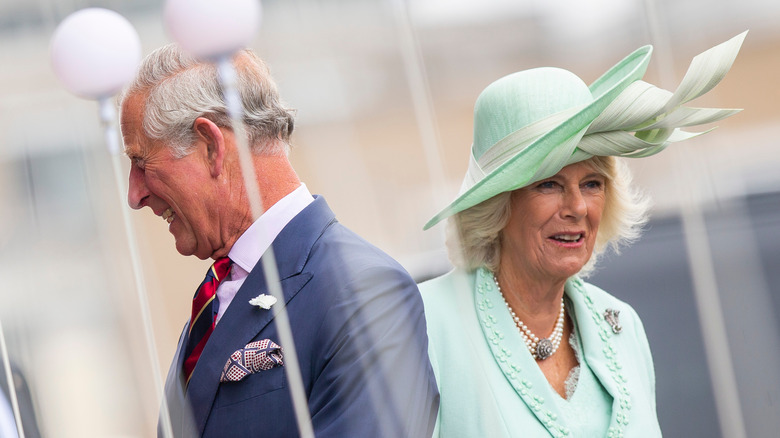 Charles and Camilla facing away