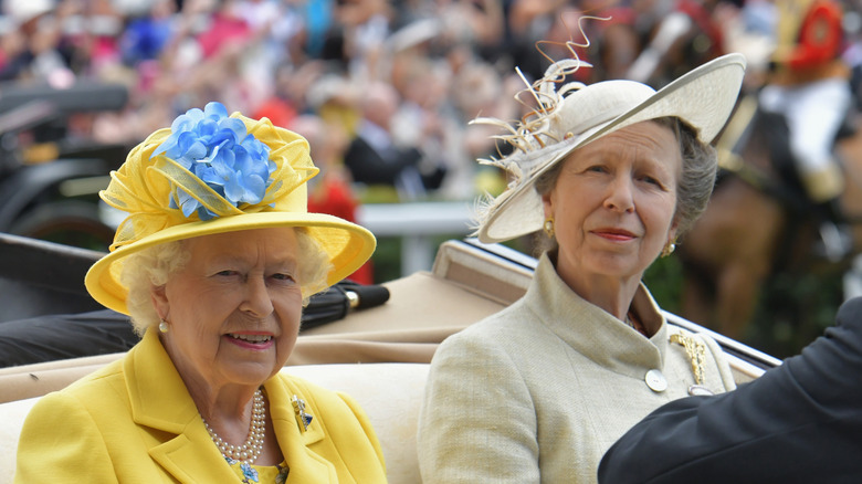 Queen Elizabeth and Princess Anne travel in a car together