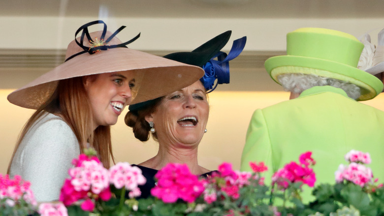 Princess Eugenie and Sarah Ferguson laughing at the queen