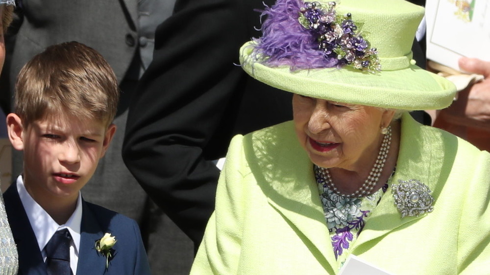 James, Viscount Severn standing with Queen Elizabeth