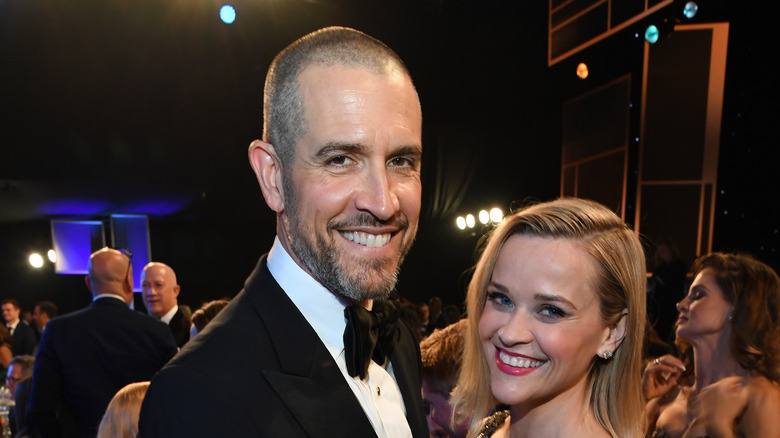Jim Toth and Reese Witherspoon at awards ceremony