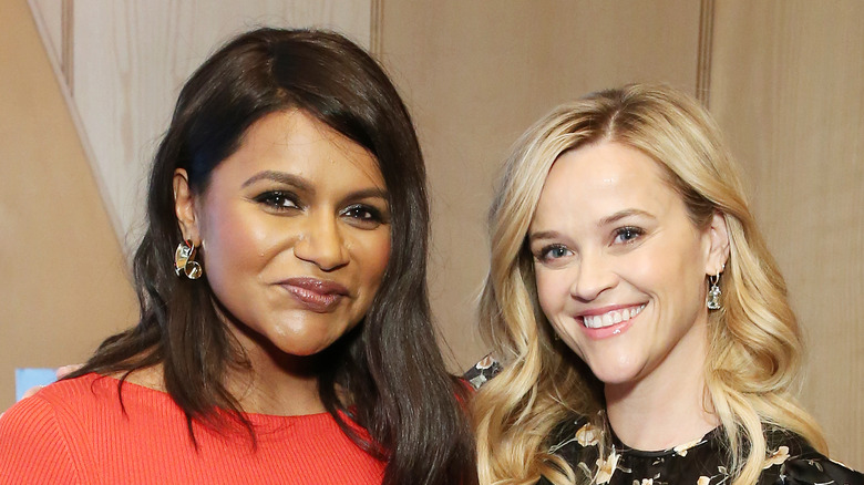 Reese Witherspoon and Mindy Kaling smiling