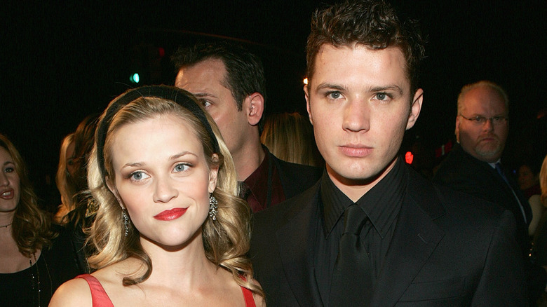 Reese Witherspoon and Ryan Phillippe, sad faces