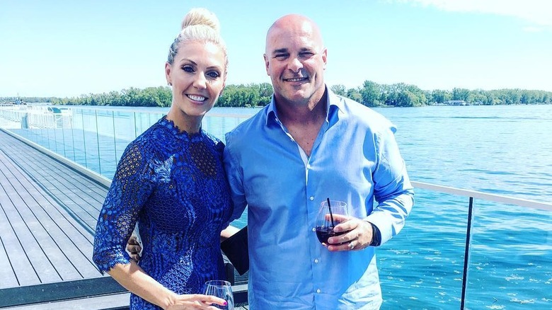 Bryan and Sarah Baeumler smiling with drinks