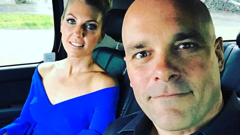 Bryan and Sarah Baeumler smiling in car