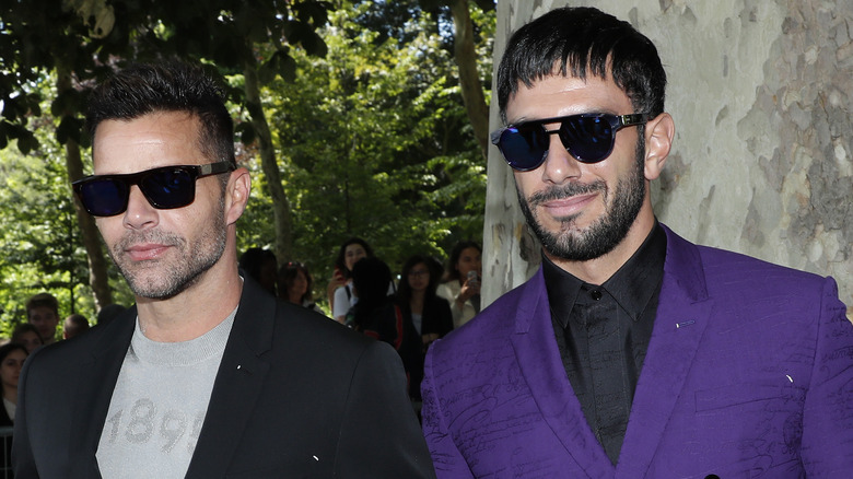 Ricky Martin and Jwan Yosef posing for photos