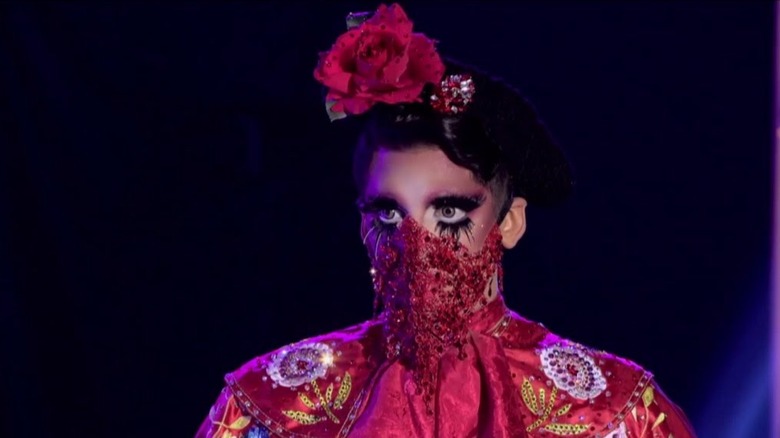 Valentina wearing a mask before lip syncing for her life