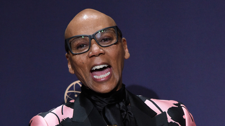 RuPaul smiling wide