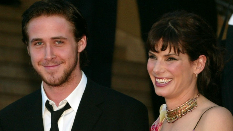 Ryan Gosling smiling with Sandra Bullock