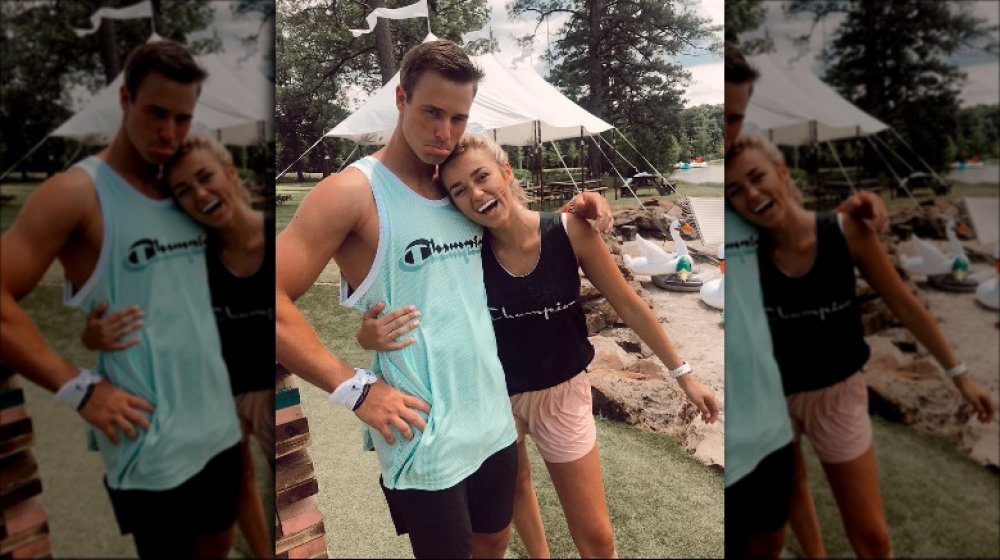 Sadie Robertson and Christian Huff with their arms around each other