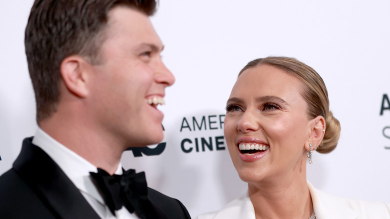 Colin Jost and Scarlett Johansson on the red carpet 