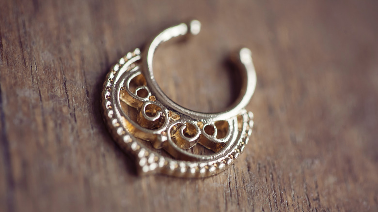 Close-up of a fake septum ring