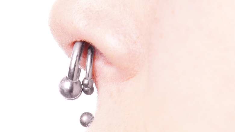 Close-up of a double septum piercing