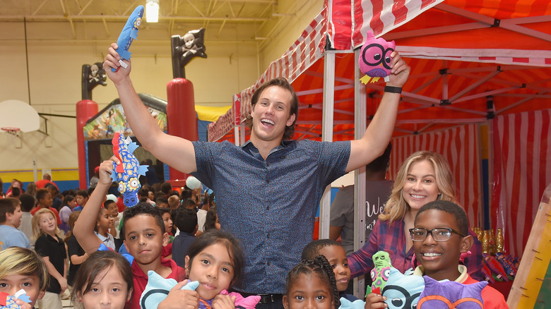 Andrew East with children