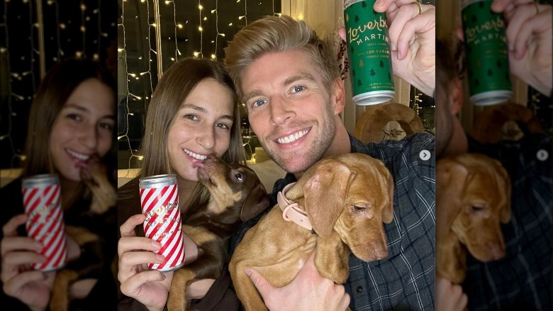 Kyle Cooke and Amanda Batula holding Loverboy drinks