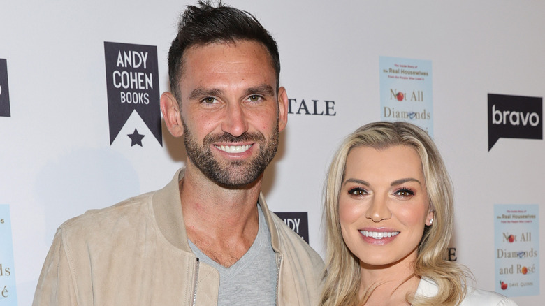 Lindsay Hubbard and Carl Radke pose on the red carpet together