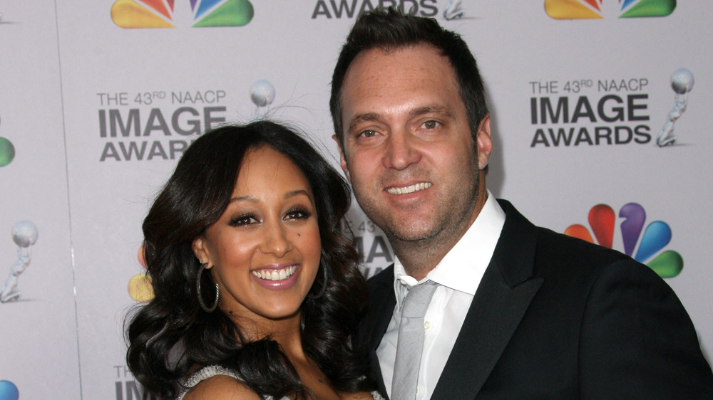 Tamera Mowry and Adam Housley at the 43rd NAACP Image Awards