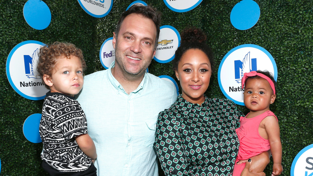 Tamera Mowry and Adam Housley at an event in 2016