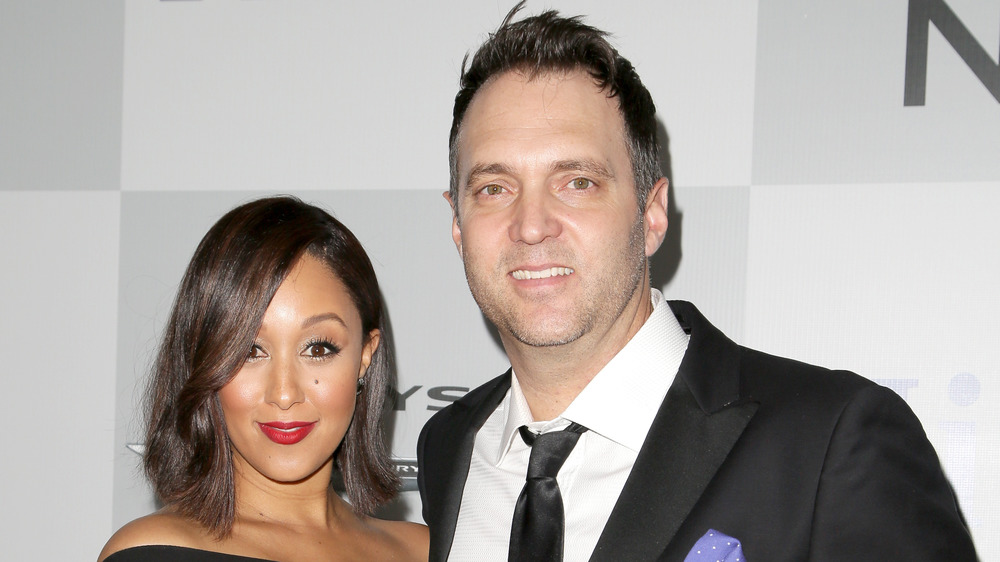 Tamera Mowry and Adam Housley at a Golden Globe Awards party in 2015